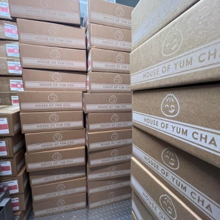 Stacks of House of Yum Cha wholesale dumpling boxes ready for delivery to restaurants across Melbourne