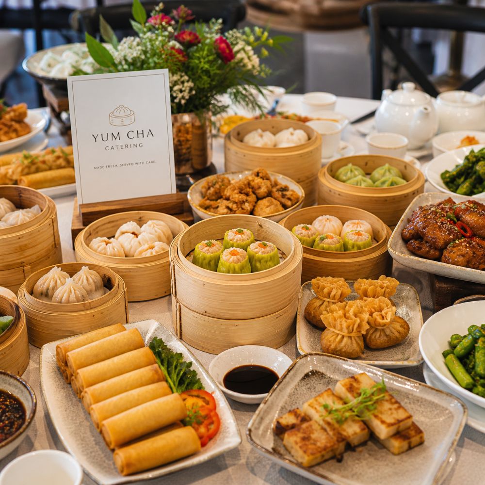 Square image of yum cha catering with dumplings, spring rolls and shared dishes for birthdays, celebrations and business events